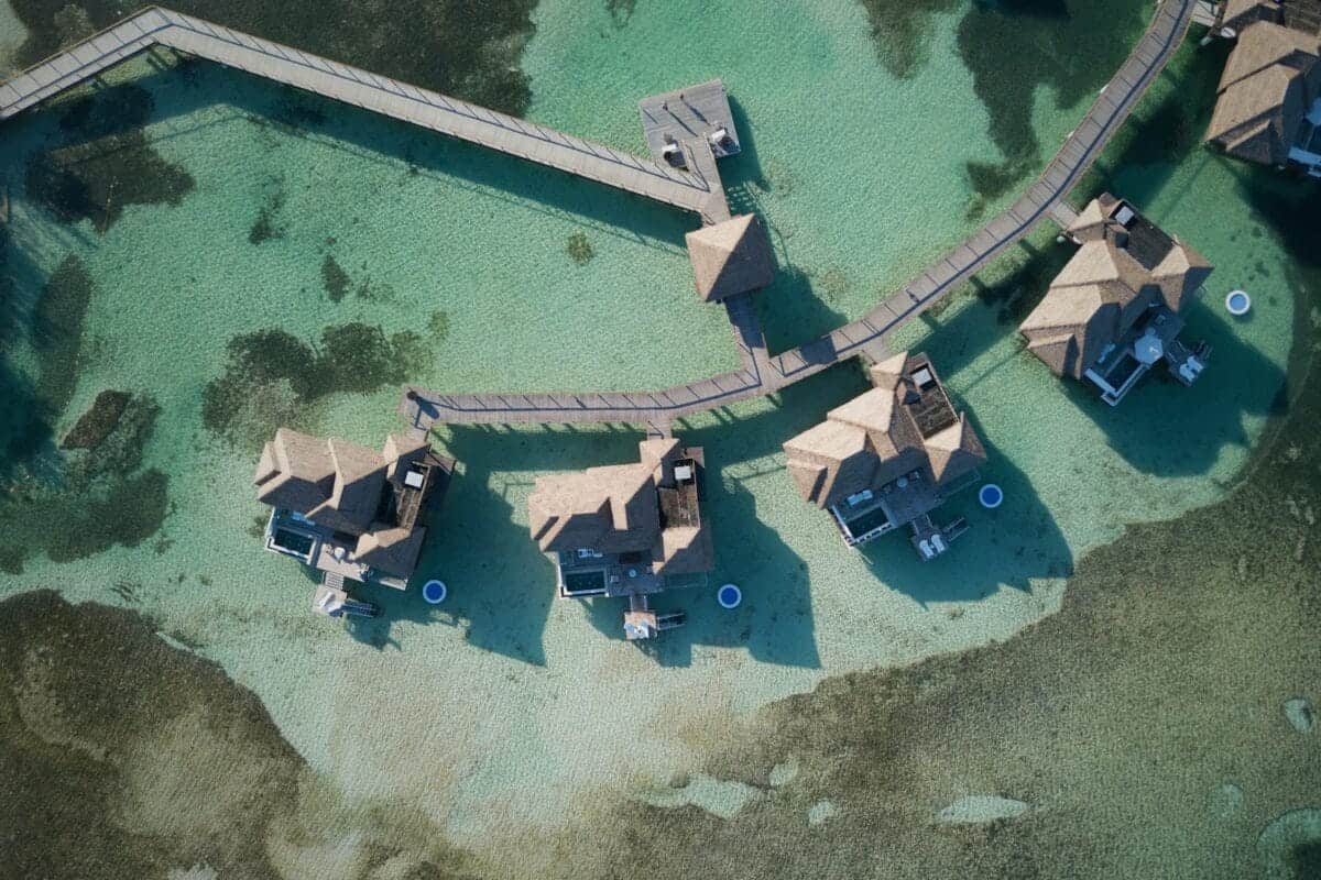 Jamaica Tours a bird's eye view of a group of huts in the water
