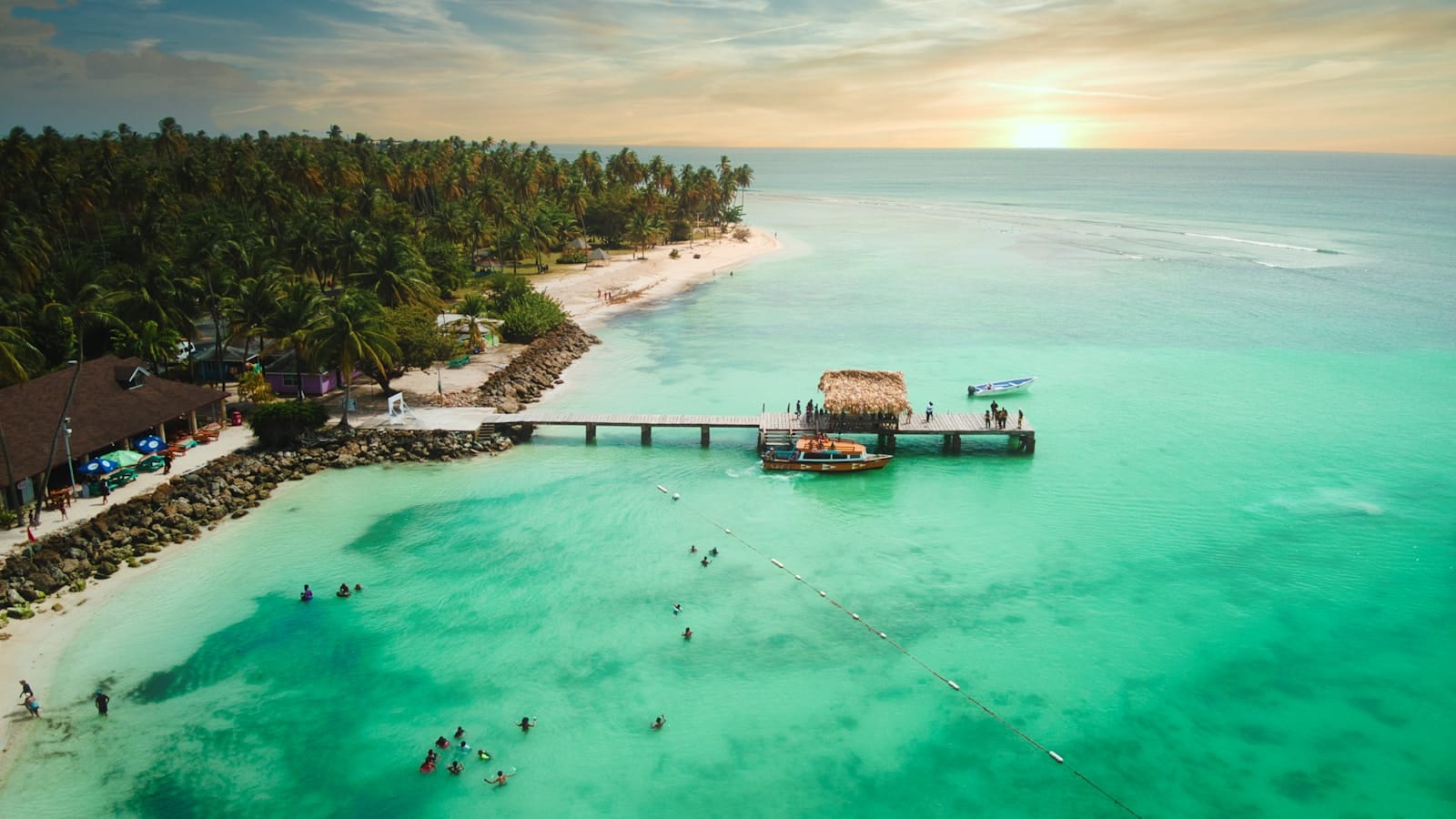 Trinidad and Tobago tours brown wooden house on green body of water during daytime