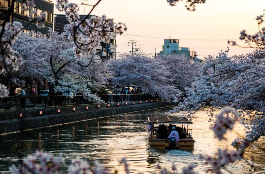 Kyoto Tours people riding on boat on river during daytime