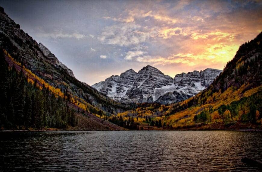 colorado tours body of water across the mountain during sunset