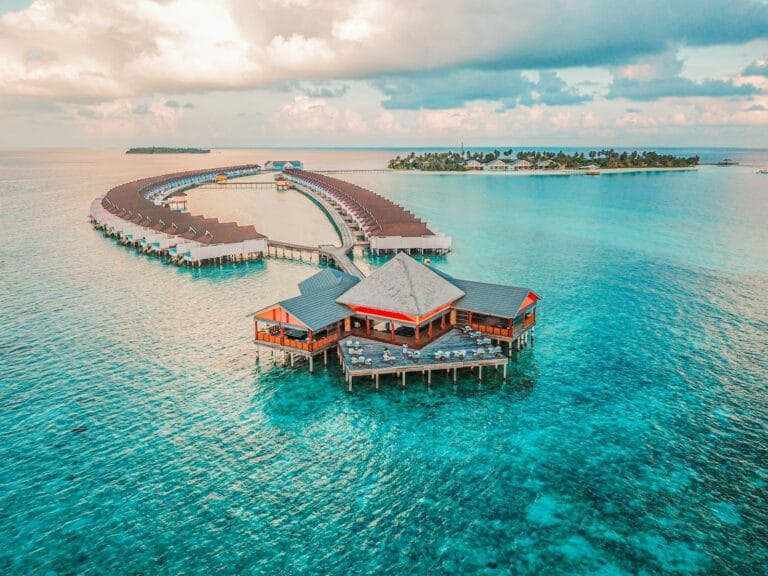 Maldives Tours aerial photography of resort rooms and island