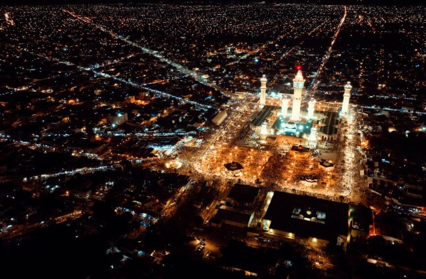 Senegal Travel Guide a large building with a tower in the middle of a city