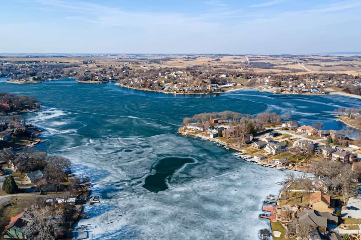 Nebraska Travel Guide aerial view of city near body of water during daytime