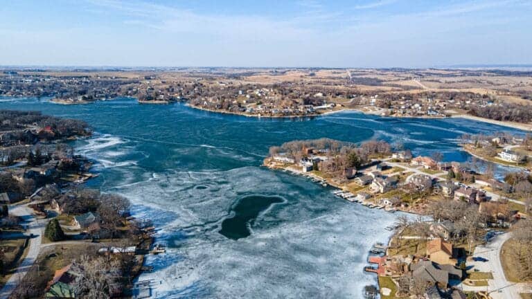 Nebraska Travel Guide aerial view of city near body of water during daytime