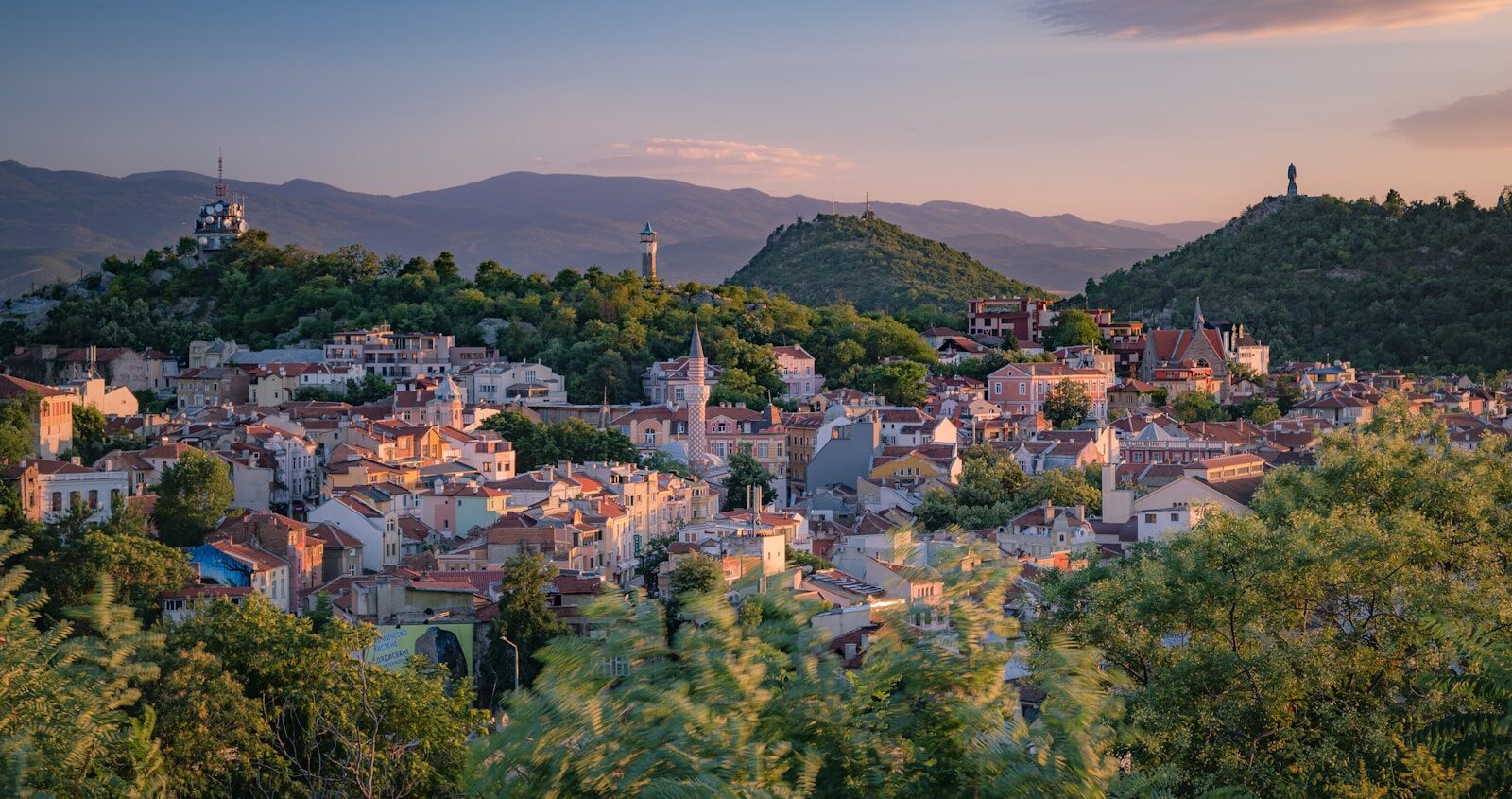 Bulgaria Travel Guide a small town surrounded by trees and mountains