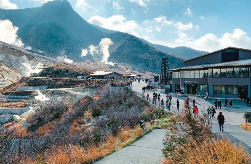 Hakone Travel Guide white and brown houses near mountain under white clouds during daytime