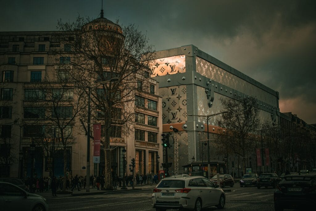 Cheap Hotel Deals a city street filled with traffic next to tall buildings