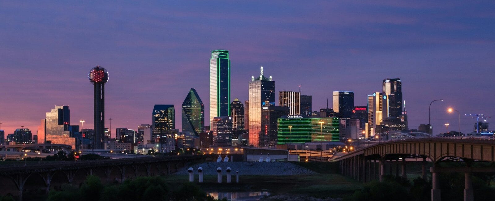 Dallas Travel Guide city skyline during night time