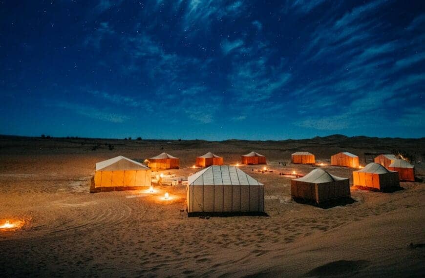 morocco travel guide white and brown tent on brown field under blue sky during night time