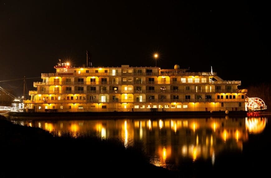 Mississippi Travel Guide a large boat sitting on top of a body of water