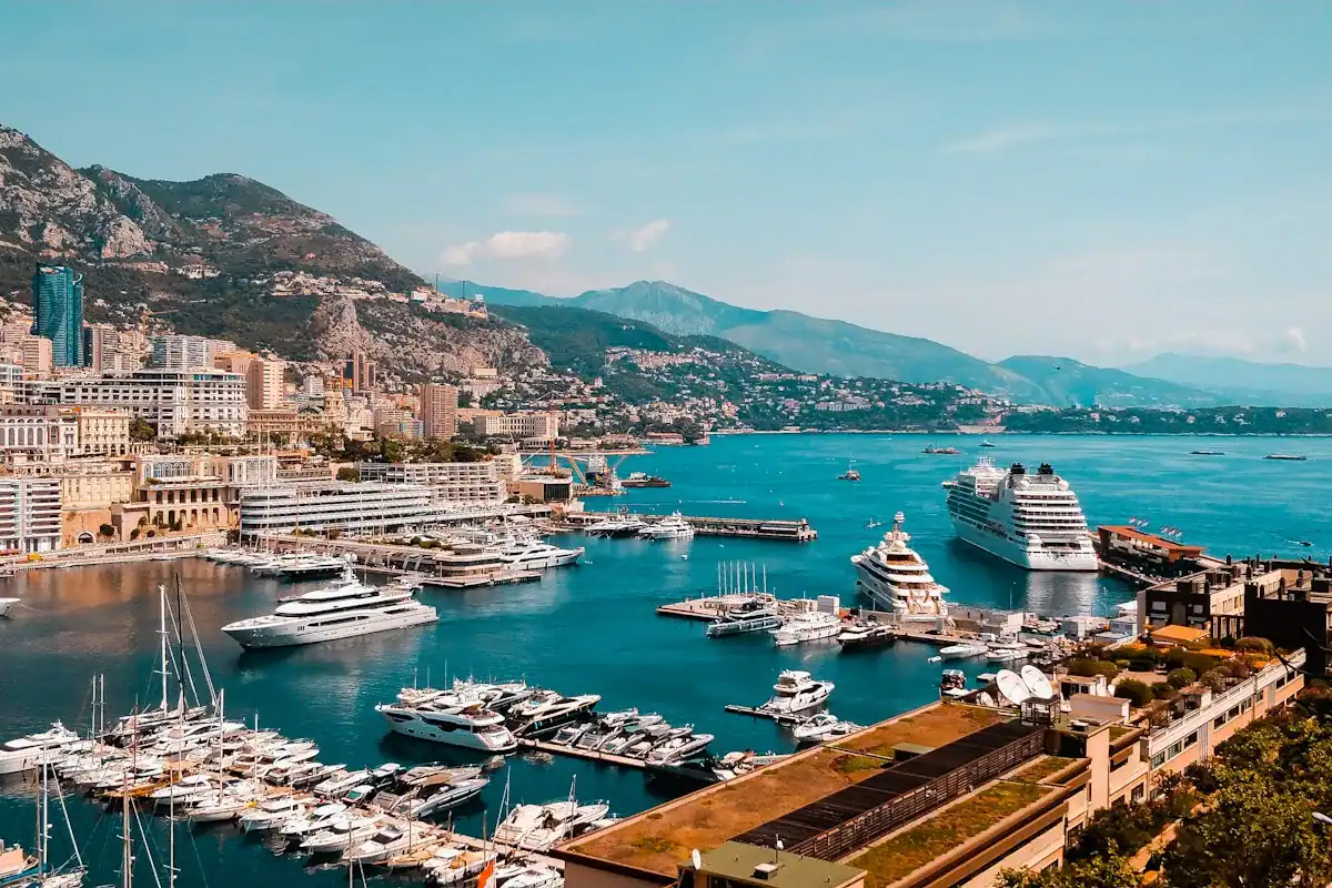 Monaco Travel Guide white and blue boat on sea during daytime
