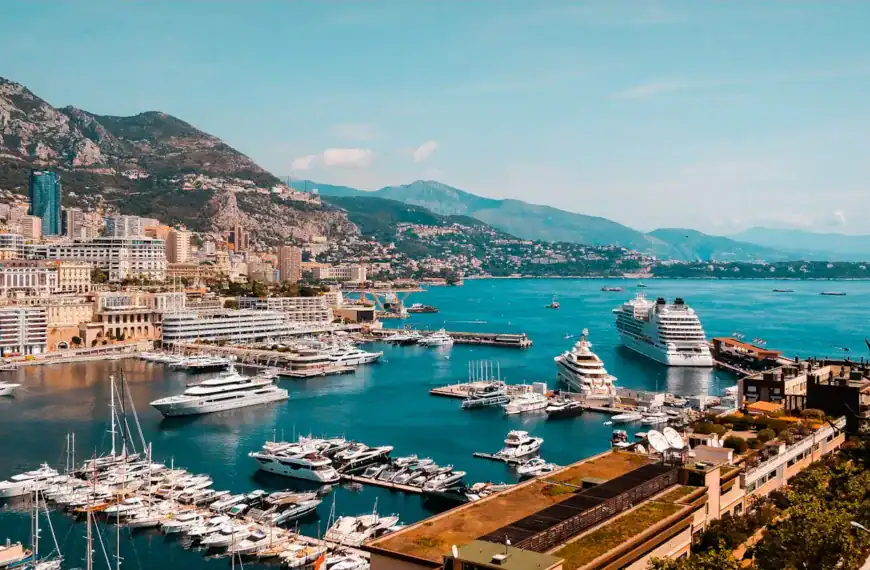 Monaco Travel Guide white and blue boat on sea during daytime