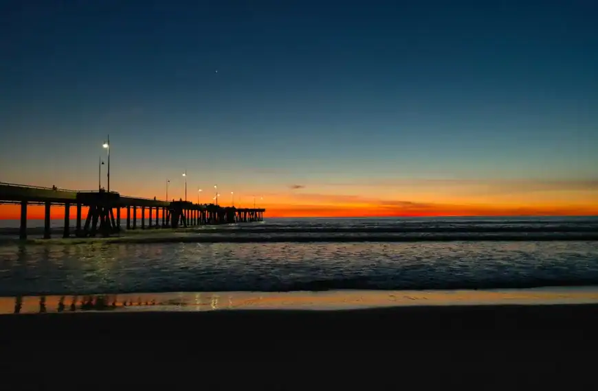 California Travel Guide silhouette of bridge on sea during sunset