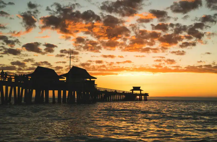 Naples Travel Guide silhouette of dock during golden hour