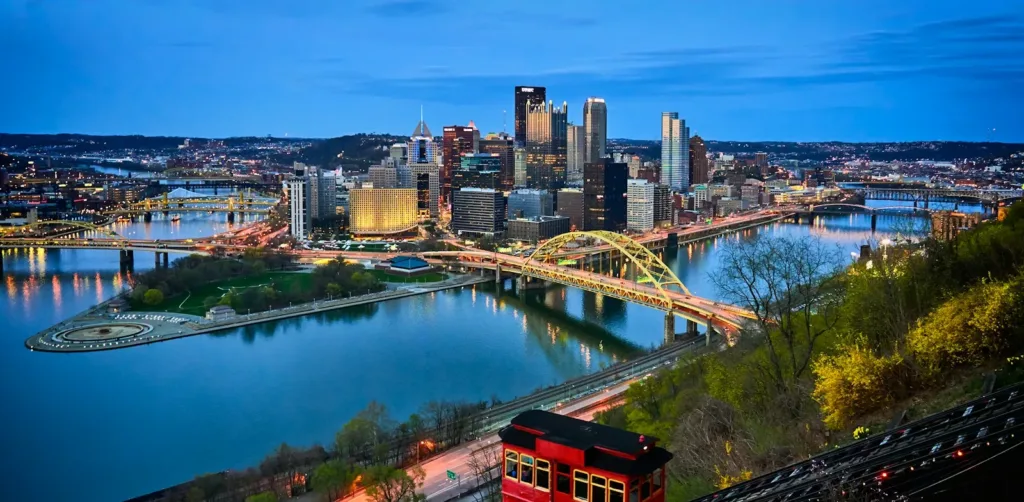 Pennsylvania Travel Guide aerial photo of bridge and buildings under blue sky