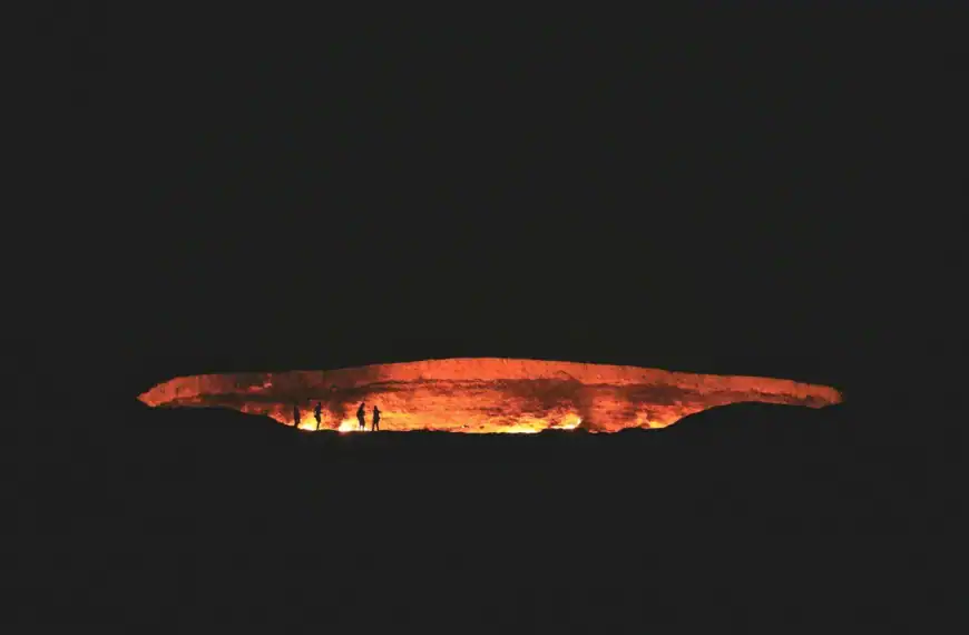 Turkmenistan Travel Guide photography of people near cave at night time