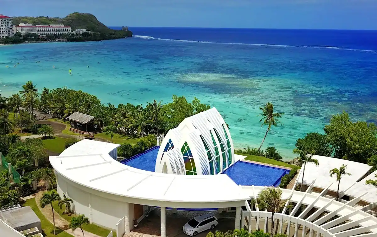 Guam Travel Guide body of water and building
