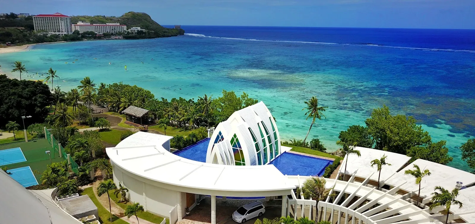 Guam Travel Guide body of water and building