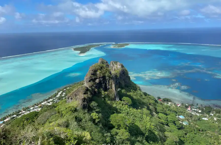 Tahiti Travel Guide a small island surrounded by water and trees