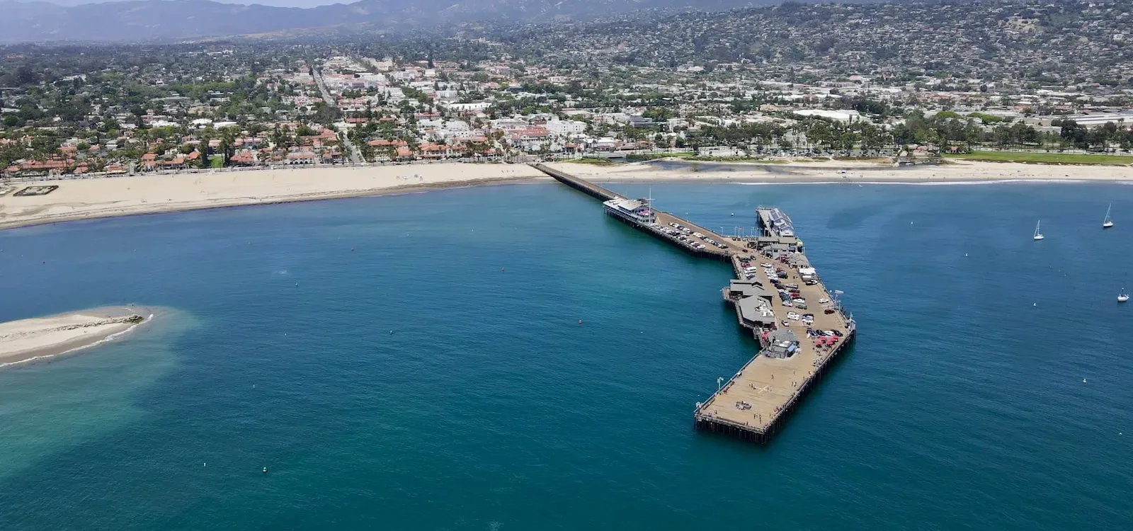 Santa Barbara Travel Guide a pier in the middle of a body of water