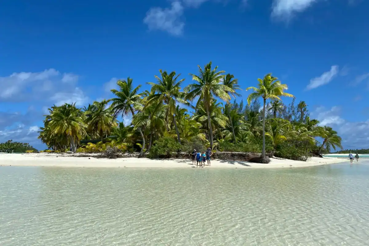 Cook Islands Travel Guide people on beach during daytime