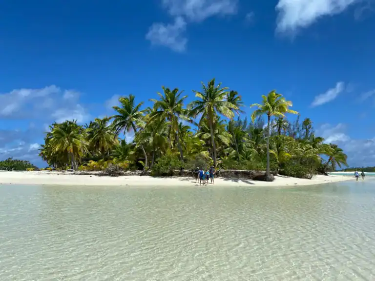 Cook Islands Travel Guide people on beach during daytime