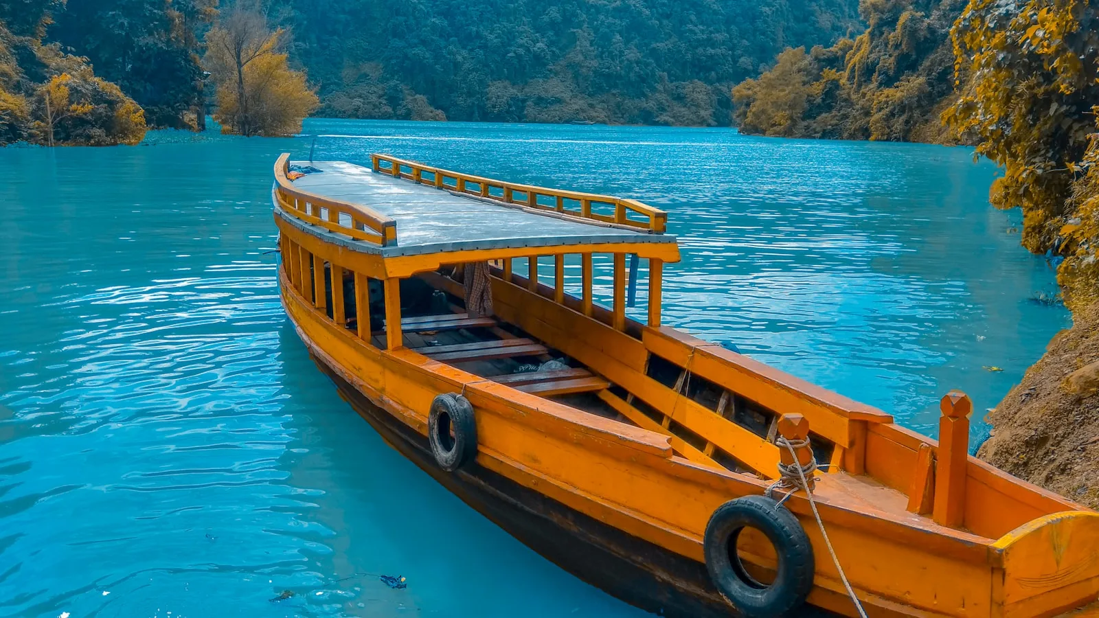 Bangladesh Tours brown wooden river boat