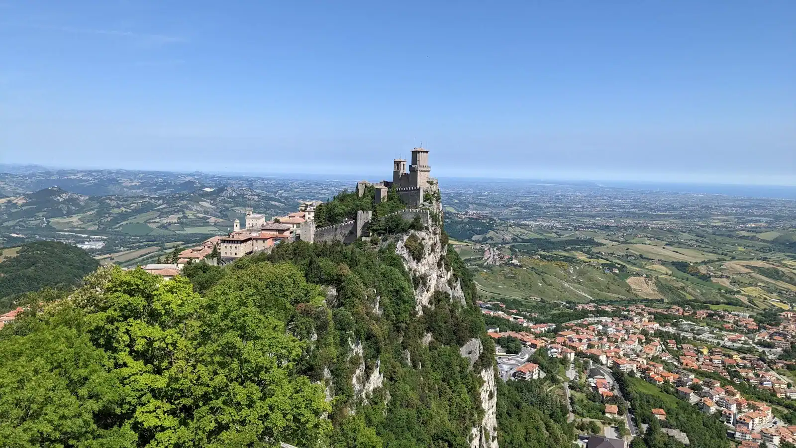 San Marino Travel Guide green trees on mountain during daytime