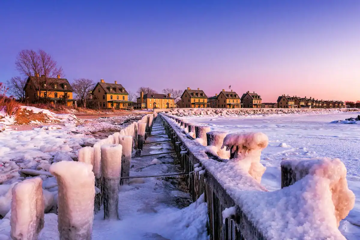 New Jersey Travel Guide a snow covered pier with houses in the background