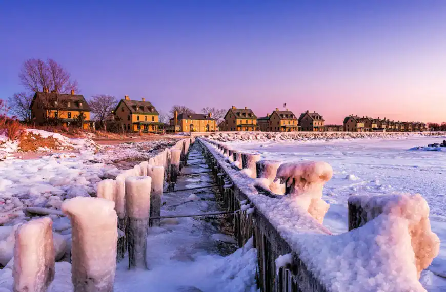 New Jersey Travel Guide a snow covered pier with houses in the background