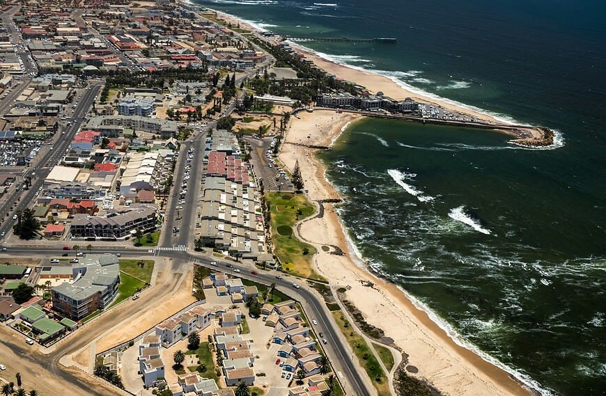 Namibia Travel Guide aerial view of city buildings near body of water during daytime