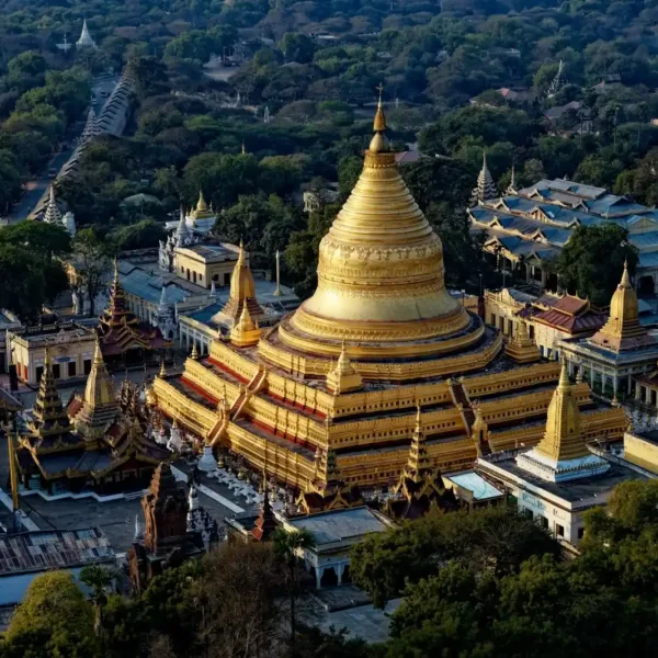 Myanmar Travel Guide brown and white concrete building near green trees during daytime