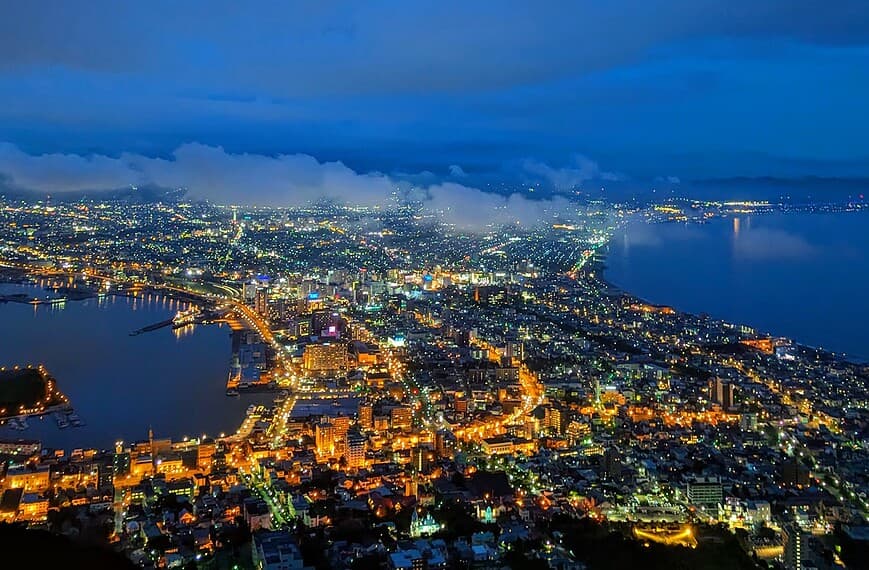 Hokkaido Travel Guide An aerial view of a city at night